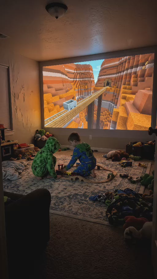 Minecraft canyon gameplay projected in a bedroom