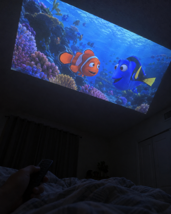 Illustrative Viremont setup: Animated ocean movie projected on bedroom ceiling